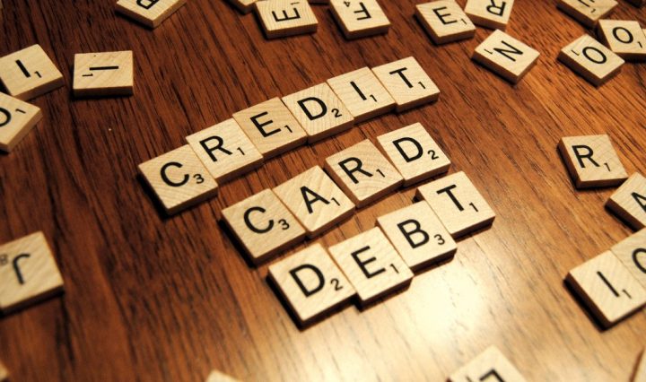scrabble pieces spelling out the words credit card debt