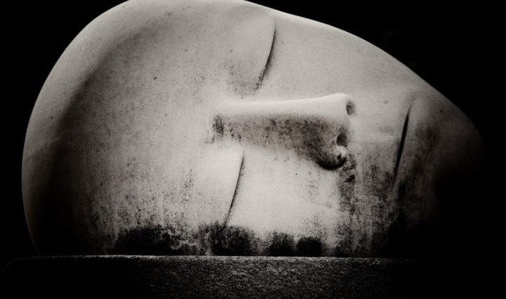 Stone head with eyes closed sleeping and dreaming